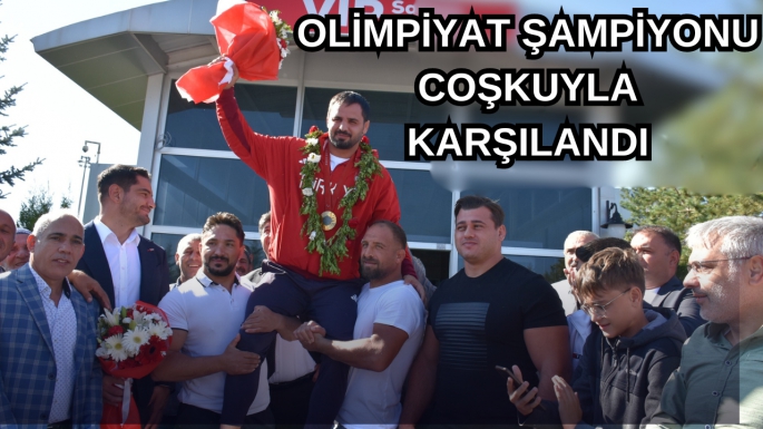 OLİMPİYAT ŞAMPİYONU COŞKUYLA KARŞILANDI