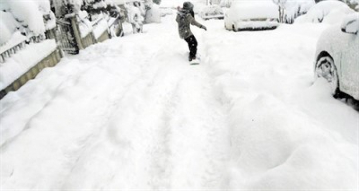 Şehrin göbeğinde snowboard keyfi